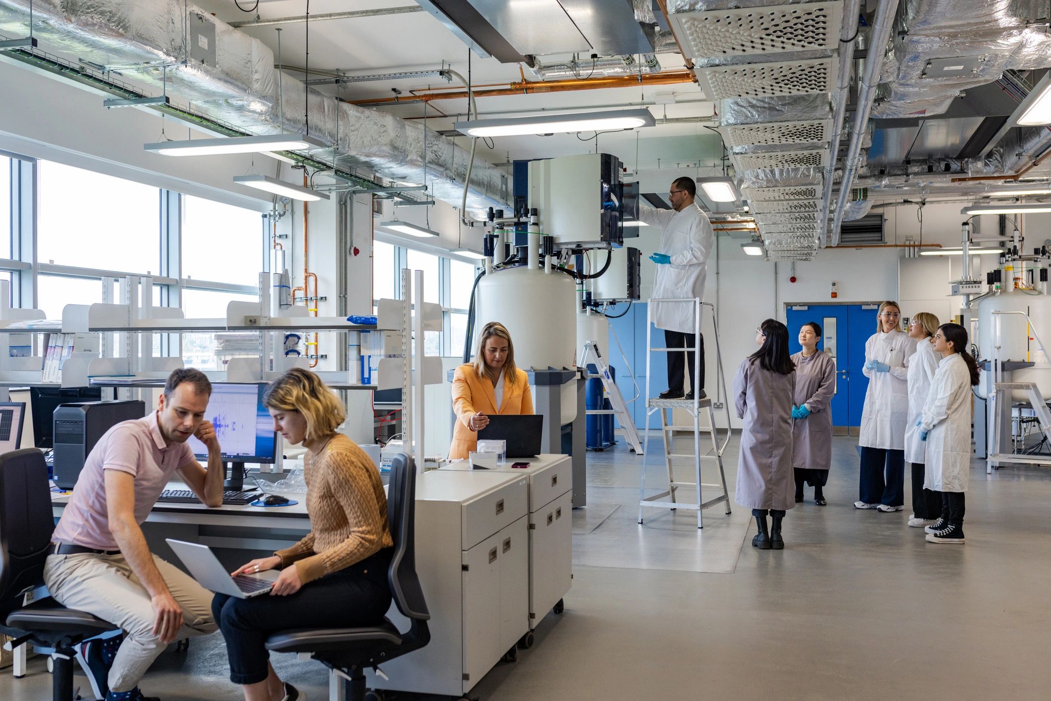Scientists reviewing test results in a professional lab environment